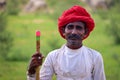 Kheralu Gujarat - July 19 2020 : The Indian shepherd with smiling face and traditional colorful dress.