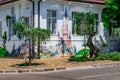 Park sculptures and fairy-tale paintings on the walls of a kindergarten at the crossroads of Royalty Free Stock Photo