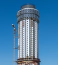 Khimki, Russia - June 3. 2019. Mayak - a residential complex under construction in the form of a lighthouse Royalty Free Stock Photo