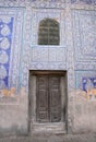 Ancient wall and door with ornament. Interior decoration of the Tosh-Hovli palace Royalty Free Stock Photo