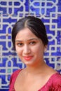 KHIVA, UZBEKISTAN - MAY 4, 2011: Portrait of a beautiful Uzbek young woman at Tosh Hovli palace