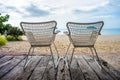 Khlong Wan beach with silhouette of twin wicker chairs Royalty Free Stock Photo