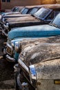 Old Soviet retro cars in the open air. Dump of a car of the Soviet era