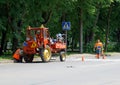 Khmelnitsky, Ukraine, 26 may 2016: Workers restoring a road mark