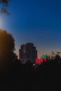 Khmelnytskyi Ukraine - 09.27.2021: evening city estate building local vertical urban photography with neon title of shopping mall