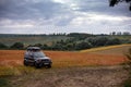 Khmelnytskyi, Ukraine - September 16, 2023: Suzuki Jimny off-road vehicle, dark gray colour, roof rack Niken, autumn day,