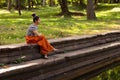 Khmer Asian Girl by Ancient Pool in Angkor Thom, Cambodia
