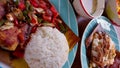 Khmer breakfast dishes, rice with pork or Bai Sach Chrouk and fried fish in spicy sauce or Trei boeng kanh chhet
