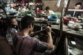 Khmer goldsmith creates necklace and accessories at a gold workshop