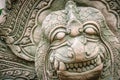 Khmer` s style Naga head made from sand stone at the public temple in Thailand. Naga or large snake according to Hindu belief. Royalty Free Stock Photo