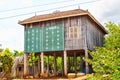 Khmer traditional wooden house, most of them is blue coloured, Klong Duan Keo, Takeo, Cambodia Royalty Free Stock Photo