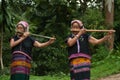 Khmu hilltribe playing flute with nose.