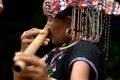 Khmu hilltribe playing flute with nose.