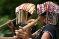 Khmu hilltribe playing flute with nose.