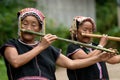 Khmu hilltribe playing flute with nose.