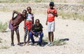 Four African youth two girls and two boys enjoy posing for photo