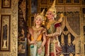 Khon is traditional Thai classic masked play enacting scenes from the Ramayana with a backdrop of Thai paintings in a