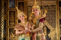 Khon is traditional Thai classic masked play enacting scenes from the Ramayana with a backdrop of Thai paintings in a