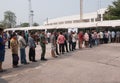 Soldier stands in row with civilians for Pre-election at Khonkaen, Thailand