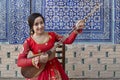 Playing local musical instrument known as Dutar, Khiva, Uzbekistan