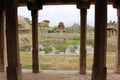 Khrisna Bazaar, pillars, and a pond in Hampi. Royalty Free Stock Photo