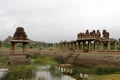 Khrisna Bazaar, pillars, and a pond in Hampi. Royalty Free Stock Photo