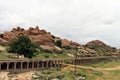 Khrisna Bazaar, pillars, and a pond in Hampi. Royalty Free Stock Photo