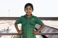 Khulna, Bangladesh, February 28 2017: A boy proudly poses in his green shirt