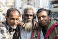 Khulna, Bangladesh, February 28 2017: Portrait of an old Muslim with two younger men