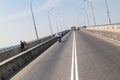 KHULNA, BANGLADESH - NOVEMBER 16, 2016: Traffic on Khan Jahan Ali Bridge over Rupsa River in Khulna, Banglade Royalty Free Stock Photo