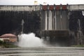 Khun Dan Prakan Chon concrete dam or Khlong Tha-Dan Barrage Dam while draining water from reservoir with thai people and foreign