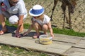 Khust, Ukraine - April 28, 2018. A little girl feeds a young dee