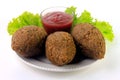 Kibbeh on the plate, traditional Lebanese cuisine food, isolated on white background Royalty Free Stock Photo