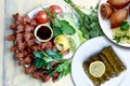 Kibbeh, stuffed vine leaves and cigkofte