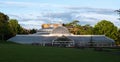 Kibble Palace Victorian glasshouse at Glasgow Botanic Gardens, Scotland UK, photographed at dusk.