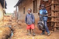 Two poor black boys in slums go to school in a poor district of Kibera