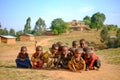 Kibuye/Rwanda - 08/25/2016: Group of african pygmy tribe children smiling and posing in ethnic village