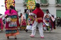 Kichwa people dancing outdoors