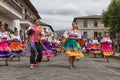 Kichwa people dancing in the street