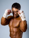 Kick-boxer in fighting stance Royalty Free Stock Photo