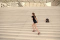 Kick feet up and go. Energetic woman climb stairs outdoors. Active life. Freedom from care. Free and carefree. Freedom Royalty Free Stock Photo