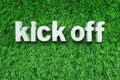 Kick Off alphabet letter top view on green grass Royalty Free Stock Photo