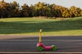 Kick scooter in the park Royalty Free Stock Photo