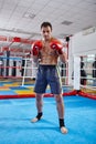 Kickbox fighter shadow boxing in the ring Royalty Free Stock Photo