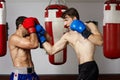 Kickbox fighters sparring in the gym Royalty Free Stock Photo