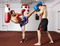 Kickbox fighters sparring in the gym