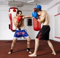 Kickbox fighters sparring in the gym Royalty Free Stock Photo