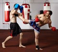 Kickbox fighters sparring in the gym Royalty Free Stock Photo