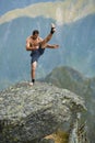 Kickboxer or muay thai fighter training on a mountain cliff Royalty Free Stock Photo