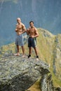 Kickboxers or muay thai fighters training on a mountain cliff